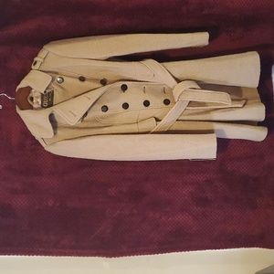 Wool/Polyester blend (70/30) lined, beautiful coat for East coast weather.